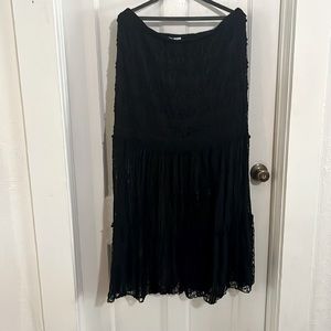 Long lace skirt with lining to knee.